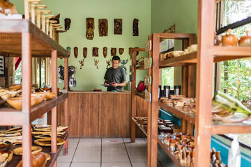 Artisan in his store