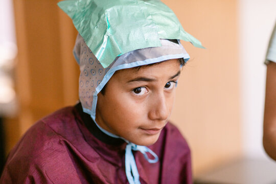 Tween boy with highlightings cap and cape