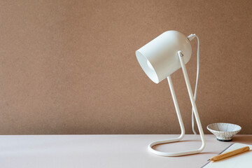 Desk home office studio with lamp
