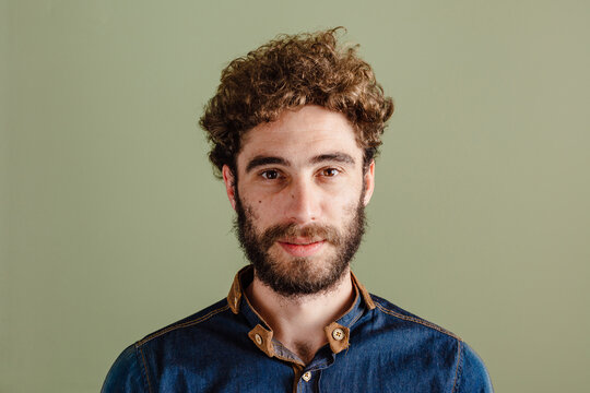 Happy man with curly hair portrait