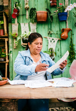 Businesswoman reviewing documents in her office