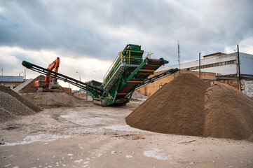 Mobile crushing and sorting complex at demolition site