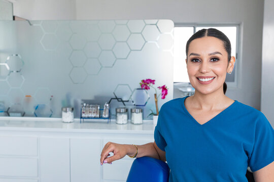 A smiling dentist at a dental clinic
