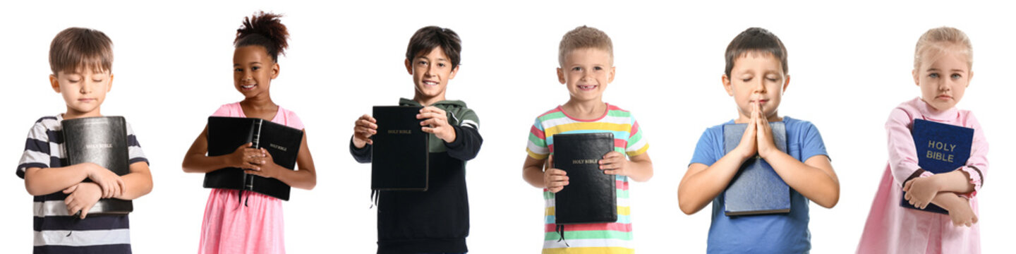 Set of children with Bible isolated on white