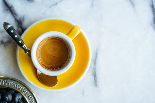 Cup of espresso on marble table