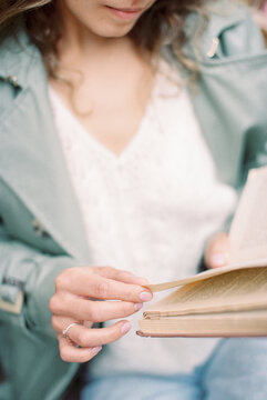 woman reading outdoors