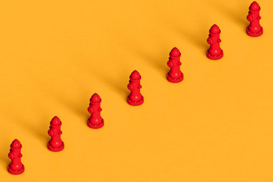 a row of red hydrants
