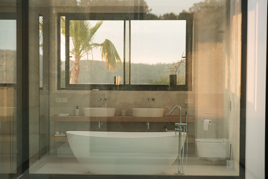 Modern bathroom with glass walls