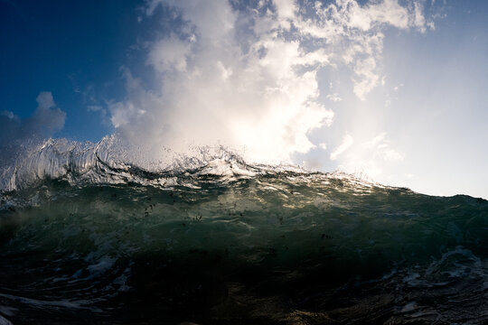 Wave hitting the beach in the morning