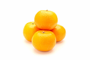 Pile of fresh oranges on a white background