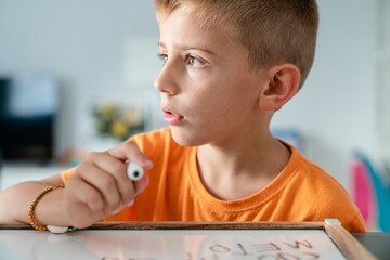 child practicing writing