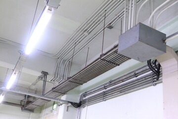 Conduit and clamp for cable electric ,Electrical Conduit with Clamp Installation on Roof ,Selective...