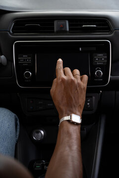 Black man Using GPS Navigator In Car