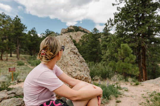 Woman hiker looking at mountain top