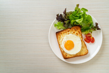 bread toasted with cheese and fried egg