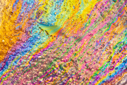 Diesel rainbow colors close up.