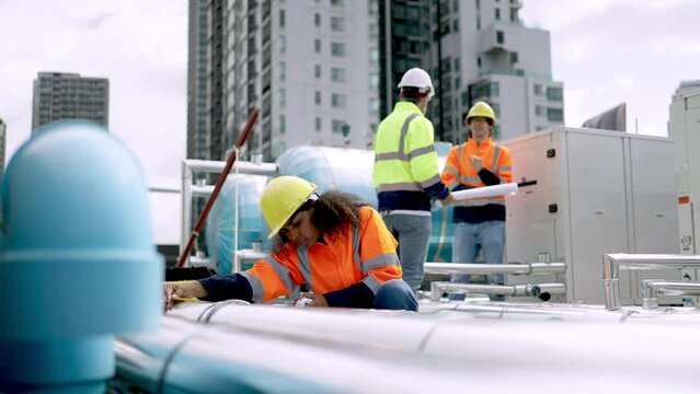 Service Engineer Maintenance And Checking About The HVAC System ( Heating, Ventilation And Air Conditioning ) On Rooftop