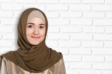 Smiling young Muslim woman looking confident