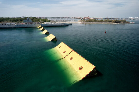 Venice MOSE tidal barrier floodgates: climate adaptation to rising sea