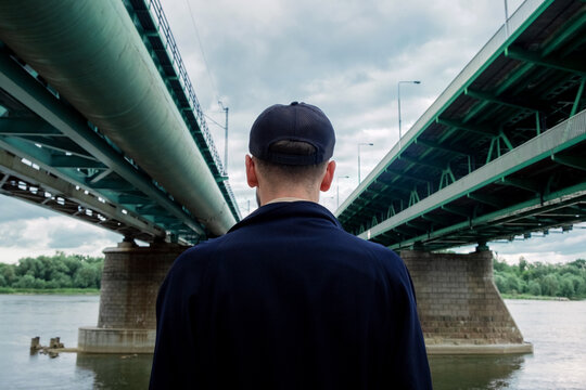 A guy under a bridge