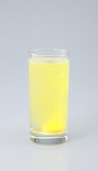 Vitamin C with B complex , Calcium , Magnesium Tablet dissolved in a glass of water.