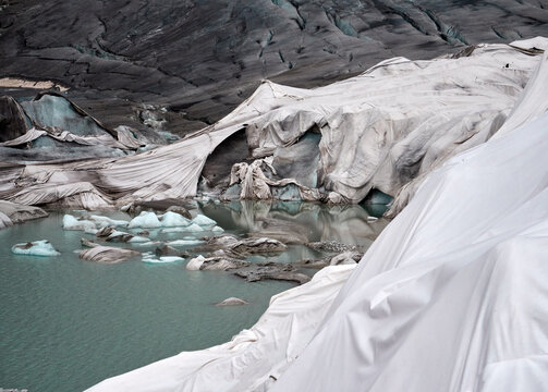 UV fabric blanket coats disappearing glacier, effect of climate crisis