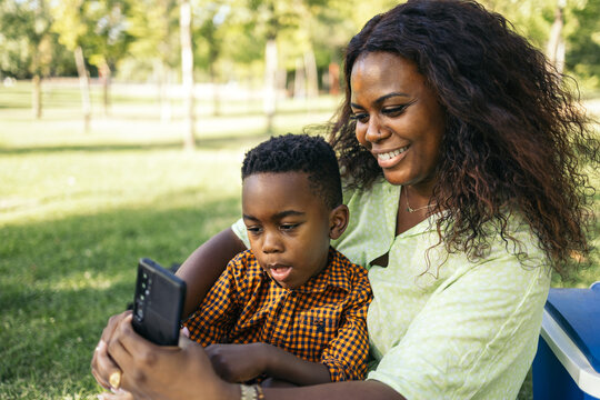 Happy mother and son taking a selfie