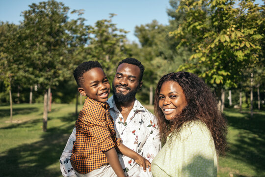 Portrait of a happy black family in the countryside