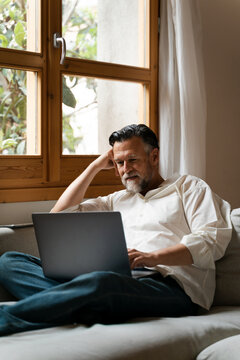 Man Working Remotely From Home