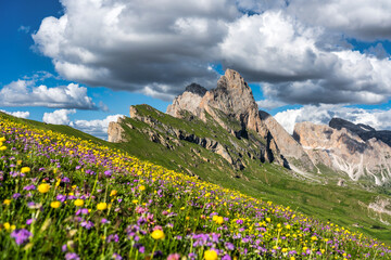 Fototapeta premium Scenery of Dolomites with the St. John's in Ranui Chapel, Santa Maddalena at sunset. Italy