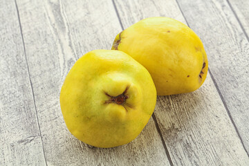 Fresh ripe yellow quince fruit