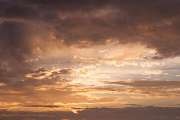 Beautiful cloudy sky during and before golden hour and sunset.
