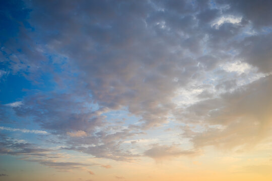 Beautiful cloudy sky during and before golden hour and sunset.