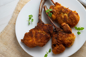 Battered lamb chops with villaroy sauce.