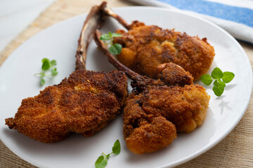 Battered lamb chops with villaroy sauce.
