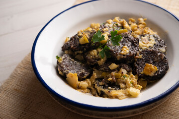 Revuelto de morcilla. Scrambled eggs with blood sausage. Typical Spanish recipe.