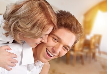 Happy young couple posing together