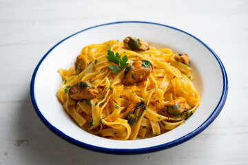 Spaghetti with garlic or mussels. Italian seafood recipe.