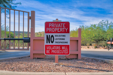 Private property signage on a post near the gate at Tucson, Arizona