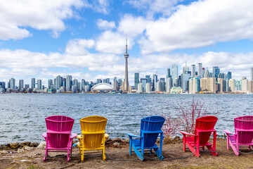 view of the city of Toronto from the island in front of toronto. This is a typical urban landscape during spring season