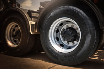 Obraz na płótnie Canvas Big Semi Truck Wheels Tires. Rubber, Tyres. Freight Trucks Transport Logistics. Auto Service Shop. 