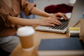 Tailor woman working in tailor shop Stylish Fashion designer tailor in workshop studio designing new collection Dressmaking and Creative.fashion collection.