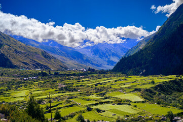 Fototapeta na wymiar Landscape in the mountains. Scenic Landscape of Baspa river valley near Chitkul village in Kinnaur district of Himachal Pradesh, India. It is the last inhabited village near the Indo-China border.