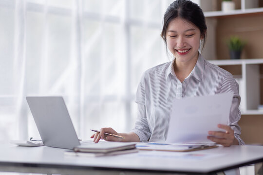 Business Documents, Auditor business Asian woman checking searching document legal prepare paperwork or report for analysis TAX accountant Documents data contract partner deal in the workplace office
