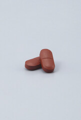 a supplement that promises to improve your health -Softgel Capsules , pill , tablets ..