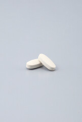 a supplement that promises to improve your health -Softgel Capsules , pill , tablets ..