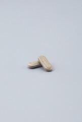 a supplement that promises to improve your health -Softgel Capsules , pill , tablets ..