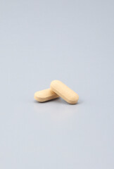 a supplement that promises to improve your health -Softgel Capsules , pill , tablets ..