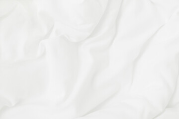 Obraz premium Texture of white blanket and bedding sheet with crumpled or messy in bedroom after wake up.