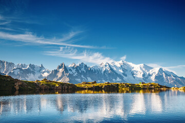 Gorgeous scene of high alpine lake Lac Blanc and Mont Blanc glacier. Chamonix resort, Graian Alps, France, Europe.